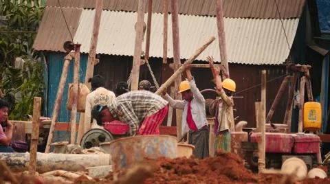 Builders at work in Yangon - Myanmar house building 2 Stock Footage 61449998