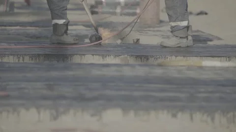 Builders working, bitumen coating, fire Stock Footage 278398294