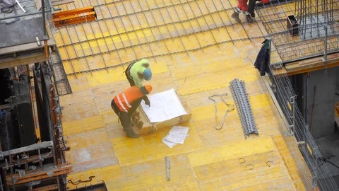 Builders working on the construction site 스톡 동영상 108629672