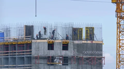 Builders working on construction site Video stock 125607044