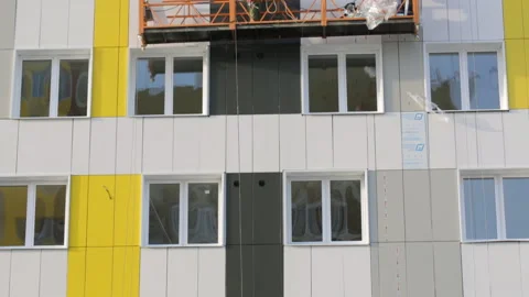 Builders working on elevator at building site Stock Footage 86926396