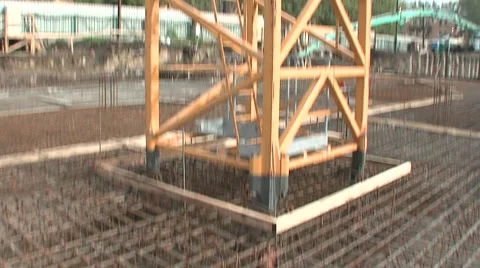 Builders working knead concrete at a construction site Stock Footage 5165079