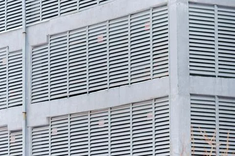 Building adorned in countless windows creates a kaleidoscopic effect, radiati Fotos de archivo