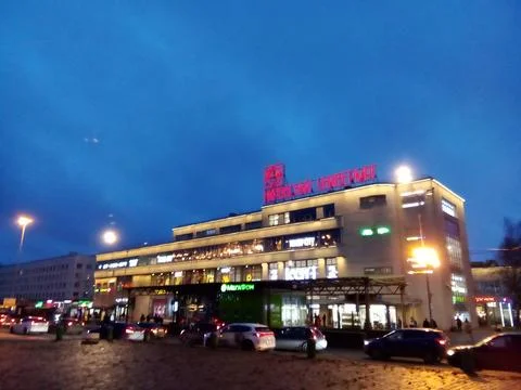 Building against a background of dark blue evening sky Stock Photos