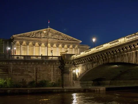 Building and bridge at night, reflected in the water, Paris, Seine, France, Stock Photos
