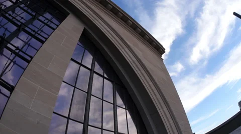 Building and Clouds Wide Angle Lens Stock Footage 64414928
