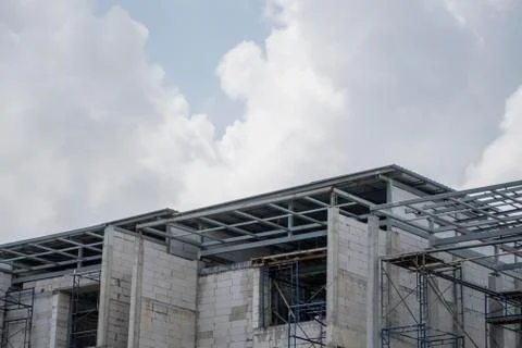 Building and Construction Site in progress. Building construction site against Stock Photos