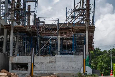 Building and Construction Site in progress. Building construction site against Stock Photos