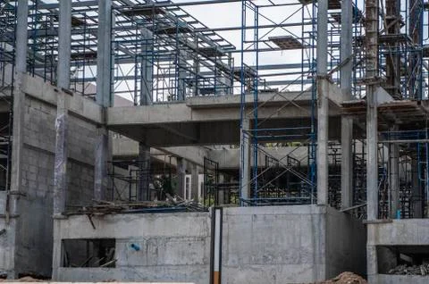 Building and Construction Site in progress. Building construction site against Stock Photos