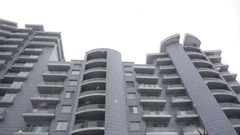 Building and falling snow in slow motion. Stock Footage 164380796