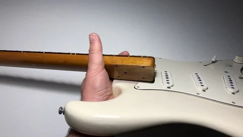 Building and fixing electrig guitar white Stock Footage 122104972