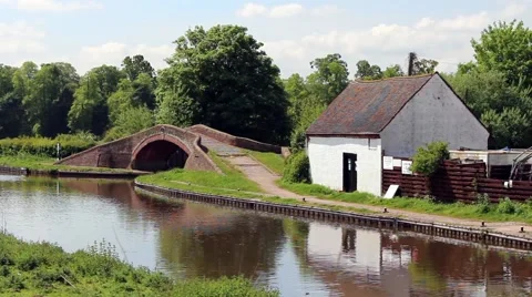 Building and stone bridge at the side of English canal. Stock Footage 63661840