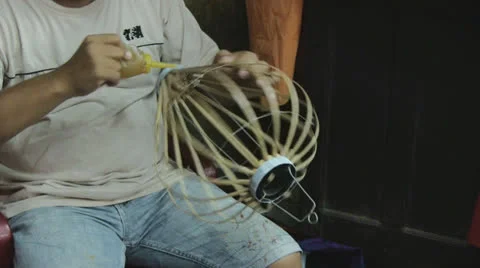 Building an asian lantern Stock Footage 22513357