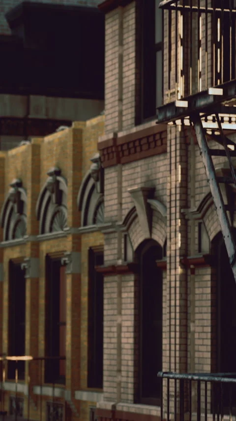 Building with balcony and brick wall in city during daylight hours Stock Footage 331687154