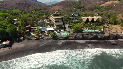 Building on beach zoom out Stock Footage 333202023