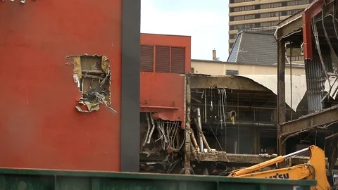 Building being Demolished Camera Pan Stock Footage 99023935