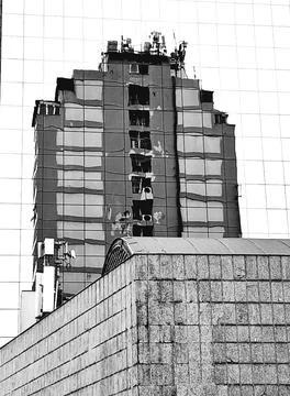 Building being reflected in another building Stock Photos