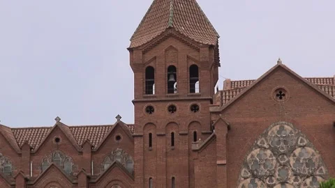 Building bell tower bricks zoom facade overcast church CosmoCaixa Barcelona Stock Footage 327206969