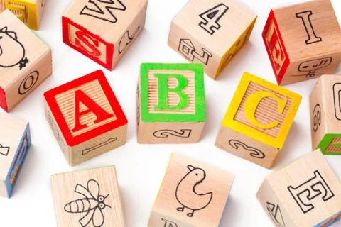 Building blocks of abc alphabets arranged beside each other Stock Photos