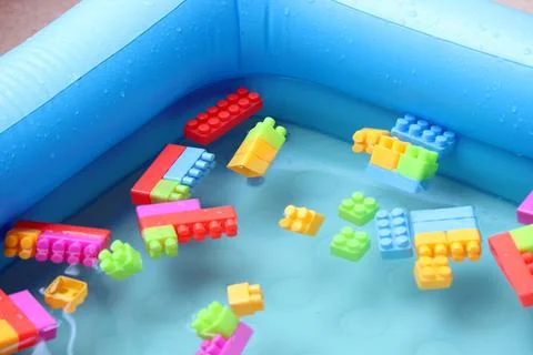 Building blocks are floating in the water and giving resemblance of tsunami. dur Foto stock