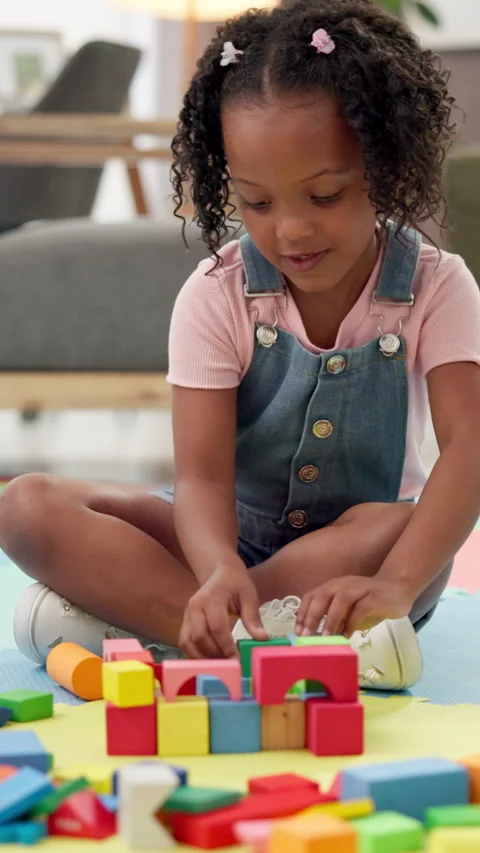 Building blocks, development and growth with girl in office for cognitive or Stock Footage 311478739