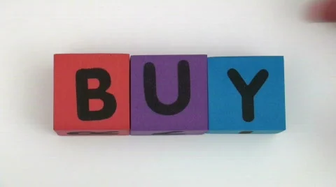 Building blocks spell Buy Stock Footage