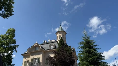 Building with blue sky and clouds passing by in real time in Karlovy Vary Stock Footage 246498754