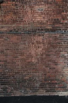 Building is of brick which is connected by concrete. Stock Photos
