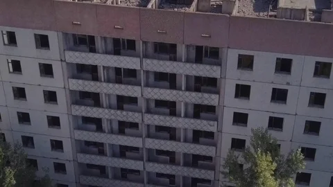 Building with broken windows. Abandoned ghost city Chernobyl, nuclear Stock Footage 108123632