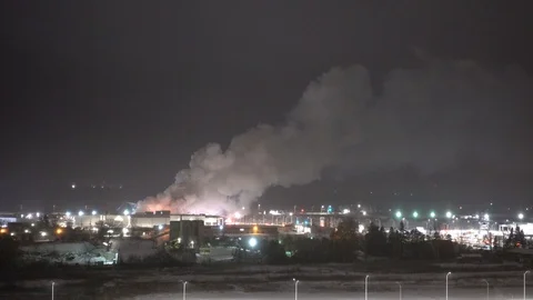 Building Burning Near Shopping Plaza At Night 4K 2 Stock Footage 88939644
