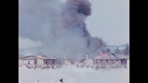 Building burns in POW camp Stock Footage 103377384
