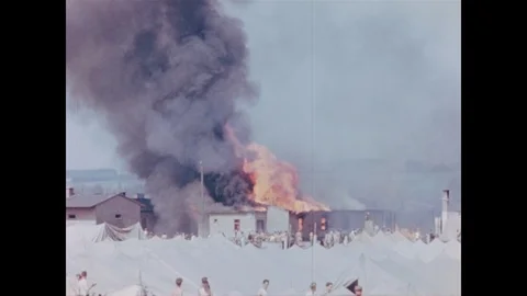 Building burns in POW camp Stock Footage 103377403