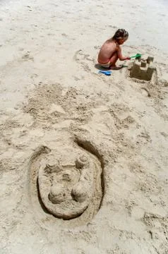 Building castle in the sand Stock Photos