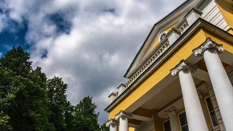 The building is in classical style on the background of the sky Stock Footage 91324391