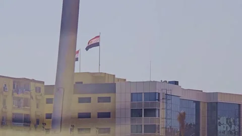 A building with a clock on the top of it Stock Footage 291584985