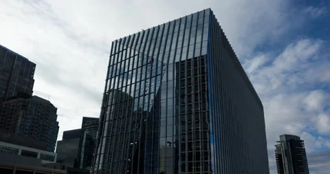 Building with clouds behind it Stock Footage 165242463