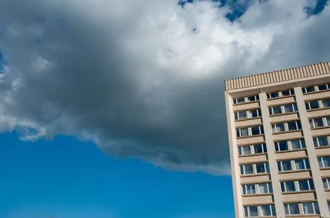 The building in the clouds, towering structure to the sky, punching the cloud Fotos Stock