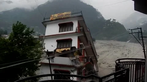 Building collapsed Disaster cloudburst in Himalayan river Ganges. Stock Footage 210082611