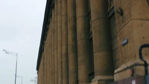 Building with columns and snowstorm Stock Footage 104260899