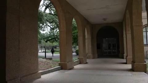 Building with columns and students walki... | Stock Video | Pond5