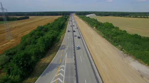 Building construct and widen multilane highway road aerial top above view 4K Stock Footage 67272238