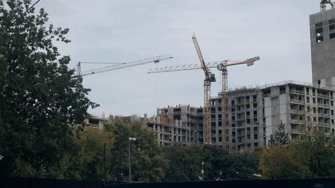 Building construction and development. Crane building site. Vídeo Stock 115861779