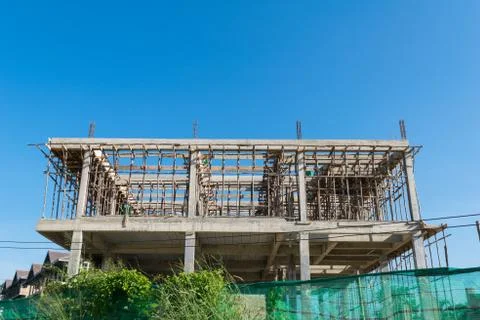 Building construction with blue sky background Stock Photos