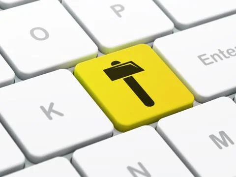 Building construction concept: Hammer on computer keyboard background Ilustración de archivo