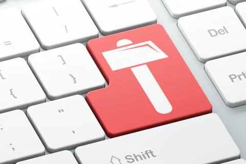 Building construction concept: Hammer on computer keyboard background Ilustración de archivo