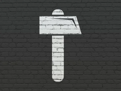 Building construction concept: Hammer on wall background Ilustración de archivo