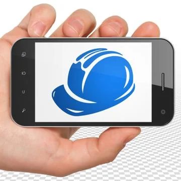 Building construction concept: Hand Holding Smartphone with Safety Helmet on Ilustración de archivo
