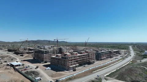 Building construction. Construction of several buildings in the town Stock Footage 252000738