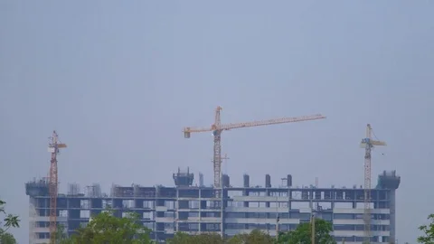 Building construction with Crane at construction site Stock-Footage 74246648