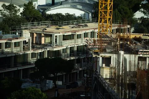 Building Construction with cranes are working in the construction site, Con.. Stock Photos
